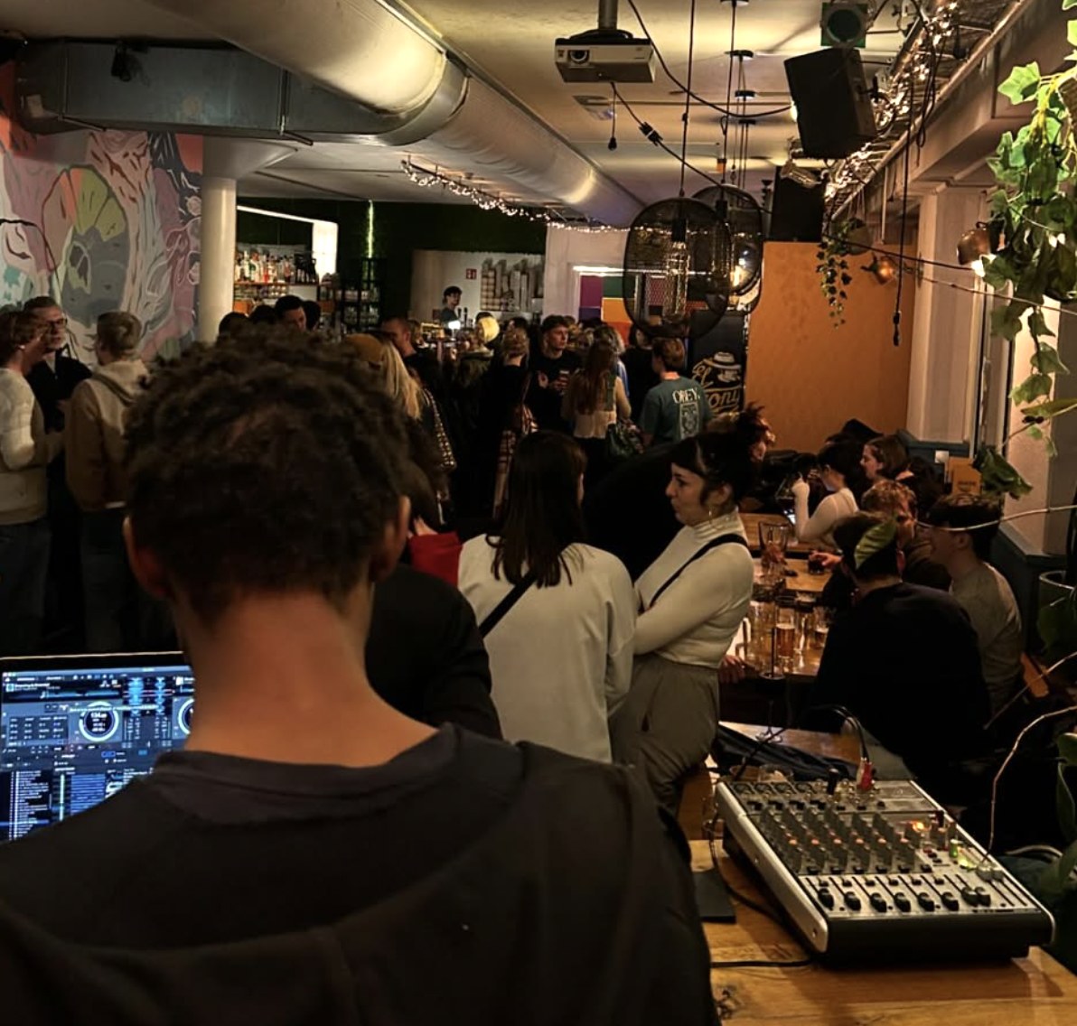 DJ playing to a full room at De Krater